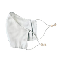 Load image into Gallery viewer, Ethical Kind Organic Peace Silk face mask with filter pockets, adjustable with eco-elastic cord and natural wood beads folded open side view