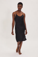Load image into Gallery viewer, Ethical Kind Organic Peace Silk Slip Midi Night Dress in Black with adjustable cross back straps.