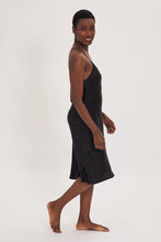Load image into Gallery viewer, Ethical Kind Organic Peace Silk Slip Midi Night Dress in Black with adjustable cross back straps.