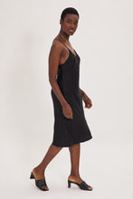Load image into Gallery viewer, Ethical Kind Organic Peace Silk Slip Midi Dress in Black with adjustable cross back straps